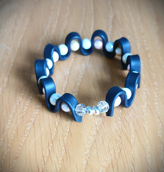 Armband Omslutna pärlor